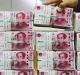 "The PBOC is using the stronger fixings to prevent panic sentiment from spreading to the currency market," said Xia Le, ...