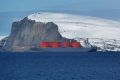 An LNG tanker sits at anchor in a fjord outside Hammerfest, northern Norway.