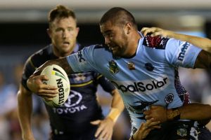 Smash and grab: Andrew Fifita forces his way through the defensive line before offloading to James Maloney, creating one ...