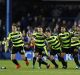 Huddersfield Town's players celebrate their victory.