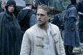 Charlie Hunnam portrays the young Arthur as an amiable chancer in King Arthur: Legend of the Sword.