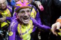 French cyclist Robert Marchand, 105, reacts after setting a record for distance cycled in one hour.