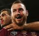 Darius Boyd (right) deserves to hold his spot as Maroons fullback, according to former coach Mal Meninga.