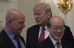 President Donald Trump walks past China's Ambassador to the United Nations Liu Jieyi, right, and National Security Adviser H.R. McMaster as he arrives for a working lunch with ambassadors of countries on the United Nations Security Council, Monday, April 24, 2017, in the State Dining Room of the White House in Washington.