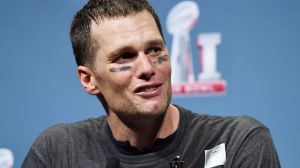 Playing a dangerous game: New England Patriots quarterback Tom Brady.