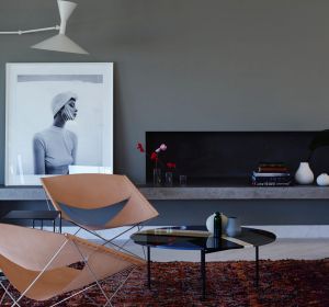 STYLING TIP: Interior design practice Amber Road has used a 10-metre-long concrete bench to link two living areas and ...