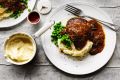 Salisbury steaks with mushroom and onion gravy.