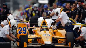 Fernando Alonso of Spain and his crew practice a pit stop during a practice session for the Indianapolis 500 IndyCar race.