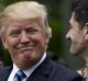 US President Donald Trump, with House Speaker Paul Ryan, after Republicans passed their healthcare bill.