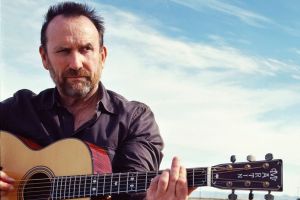 Colin Hay is ready to save your soul, if not your house.