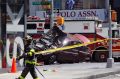 A smashed car sits on the corner of Broadway and 45th Street in New York's Times Square after ploughing through a crowd ...