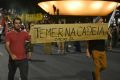 Demonstrators carry a sign that reads in Portuguese "Temer in jail" and calls for direct elections in Brasilia on Thursday.