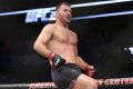 Still the champ: Stipe Miocic celebrates after making short work of Junior Dos Santos.