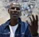 US artist Mark Bradford poses next to his work at the Pavilion of the United States, during a preview of the 57th ...