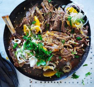 Slow-roasted lamb shoulder with almonds.