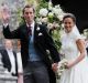 Pippa Middleton and James Matthews smile for the cameras after their wedding at St Mark's Church in Englefield.