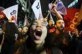 Demonstrators chant during the anti-Temer protest in Rio on May 18.