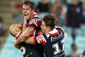 SYDNEY, AUSTRALIA - MAY 21: Mitchell Pearce of the Roosters celebrates after scoring the winning try during the round 11 ...