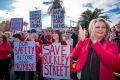 Essendon locals rally against the government's plans for the Buckley Street level crossing. 