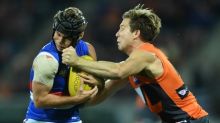 On the edge: Toby Greene accepted a two-match ban for this hit on Caleb Daniel.
