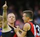 Josh Green celebrates a goal with Orazio Fantasia.