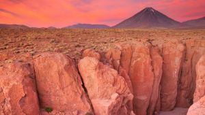 The foot of Volcan Licancabur in the Atacama Desert, northern Chile, at sunset. 