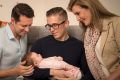 Andy Brough, Simon Curtis and Carla Pincombe, who volunteered to be a surrogate for the gay couple.