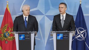 File - Joint press point with NATO Secretary General Jens Stoltenberg and the Prime Minister of Montenegro, Dusko Markovic, at NATO Headquarters in Brussels, Belgium, 26 January, 2017.