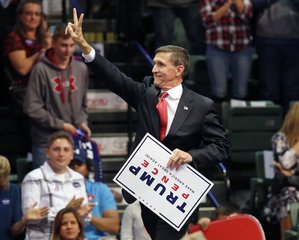 In this Oct. 3, 2016 file photo, former Trump administration national security adviser Michael Flynn campaigns for then-Republican presidential candidate Donald Trump during a Trump rally, in in Loveland, Colo