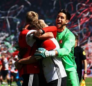 Australian Brad Jones (in green) celebrates Feyenoord's win in the Dutch Eredivisie.