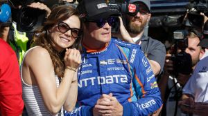 Scott Dixon, of New Zealand, with his wife, Emma, at the Indianapolis Motor Speedway.