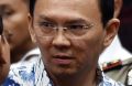  Basuki "Ahok" Tjahaja Purnama talks to his lawyers after his sentencing hearing in Jakarta on Tuesday.