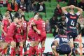 Samu Kerevi and teammates after the match-winning try during round 12.