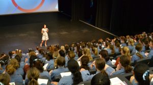 Nicole Pedersen-McKinnon presenting to high school students.