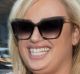 Rebel Wilson appears outside court for the beginning of her defamation case on Monday