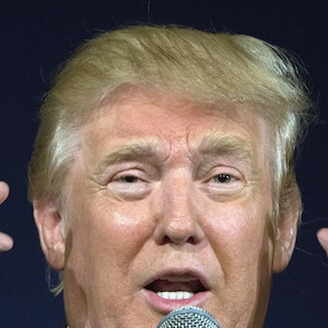 Republican presidential hopeful Donald Trump remarks about Texas Gov. Rick Perry's glasses at his South Carolina campaign rally in Bluffton, S.C., Tuesday, July 21, 2015.  (AP Photo/Stephen B. Morton)