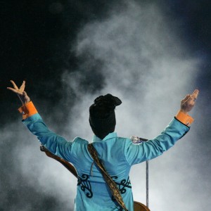 In this Feb. 4, 2007 file photo, Prince performs during the halftime show at Super Bowl XLI at Dolphin Stadium in Miami. Prince's publicist has confirmed that Prince died at his home in Minnesota, Thursday, April 21, 2016. He was 57. (AP Photo/Chris Carlson, File)