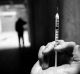 Drugs; Pic Jason South; Age Gen; Pic shows a young heroin addict hitting up in an alley in the city. generic needle, ...