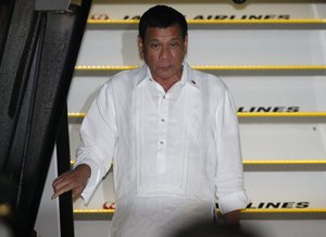 Philippine President Rodrigo Duterte arrives at Haneda international airport in Tokyo, Tuesday, Oct. 25, 2016.