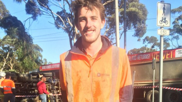 Cable hauler Saul McCausland pulled the truck driver from his rolled vehicle.