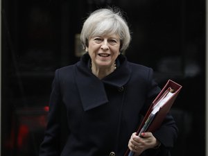 British Prime Minister Theresa May leaves 10 Downing Street in London, to attend Prime Minister's Questions at the Houses of Parliament, Wednesday, Feb. 1, 2017.