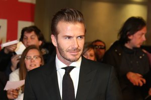 David Beckham poses for photographers upon arrival at the Pride of Britain Awards 2015 in London, Monday, Sept. 28, 2015.