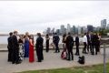 Justin Trudeau jogs past a group of students en route to their school formal.