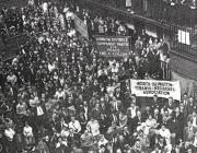 A crowd defends Kennistoun House, 1960