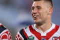 SYDNEY, AUSTRALIA - MARCH 23: Dylan Napa (L) and Shaun Kenny-Dowall (R) of the Roosters celebrate victory after the ...