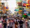 People walking along the busy streets of Khao San Road in Bangkok, Thailand.