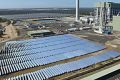 Solar panels lie in waste at Kogan Creek Power Station, near Chinchilla