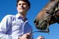 Godolphin head man: James Cummings and wife Monica with Hallowed Crown
