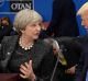 US President Donald Trump, right, speaks with British Prime Minister Theresa May.