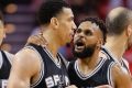 San Antonio Spurs guard Patty Mills (right) with guard Danny Green.